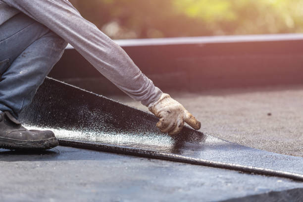 Professional Exterior Waterproofing technician working in Athens, GA